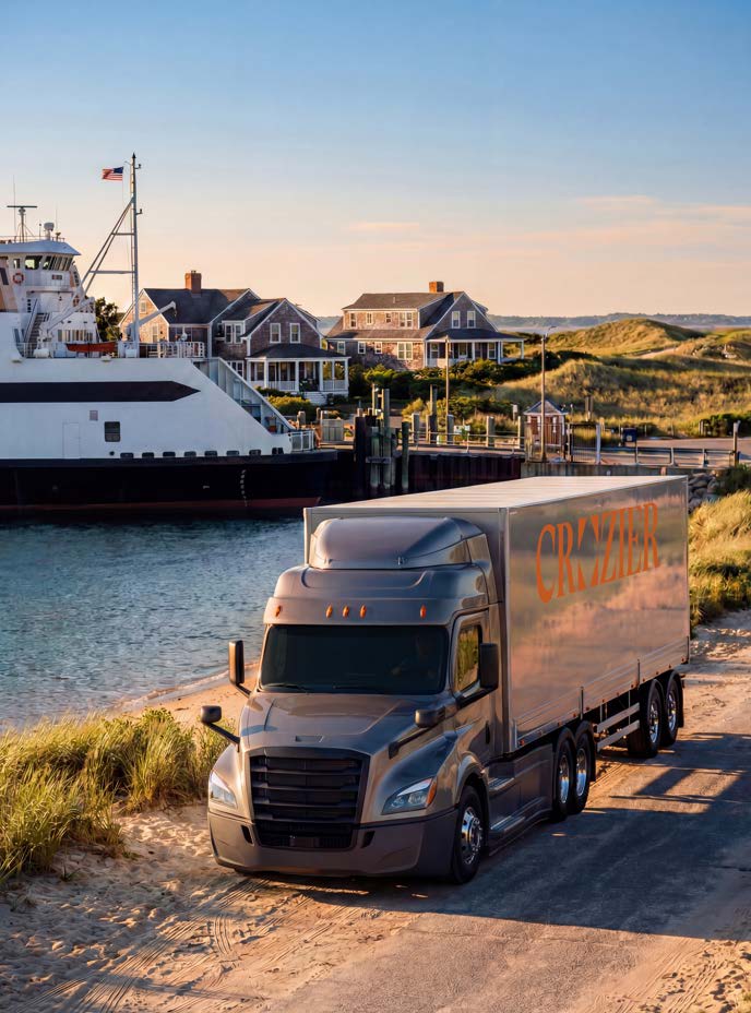 Crozier trucks loading onto ferry